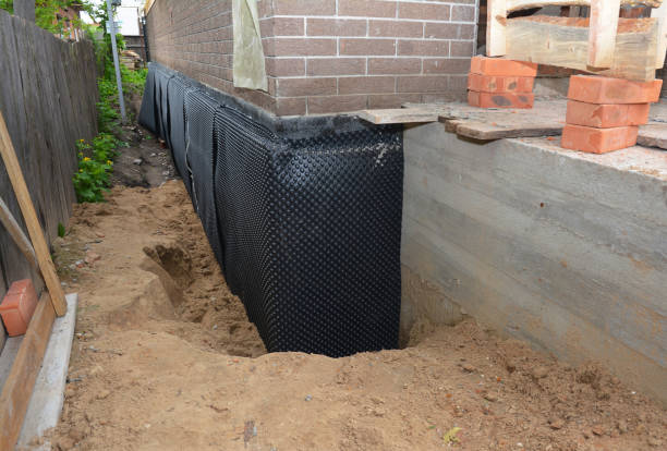 Happy homeowners after waterproofing job in Poy Sippi